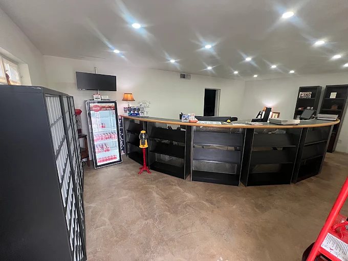 Inside the front office with service counter and mailboxes